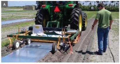 Tractor tilling soil