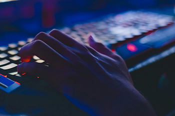 Person typing on computer